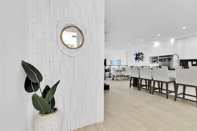 a view of dining room with furniture and wooden floor