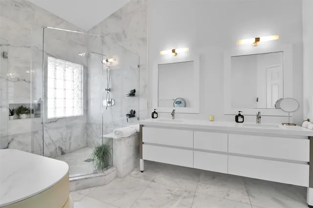 a view of a hallway with washer and dryer