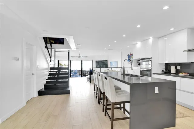a kitchen with counter top space and appliances
