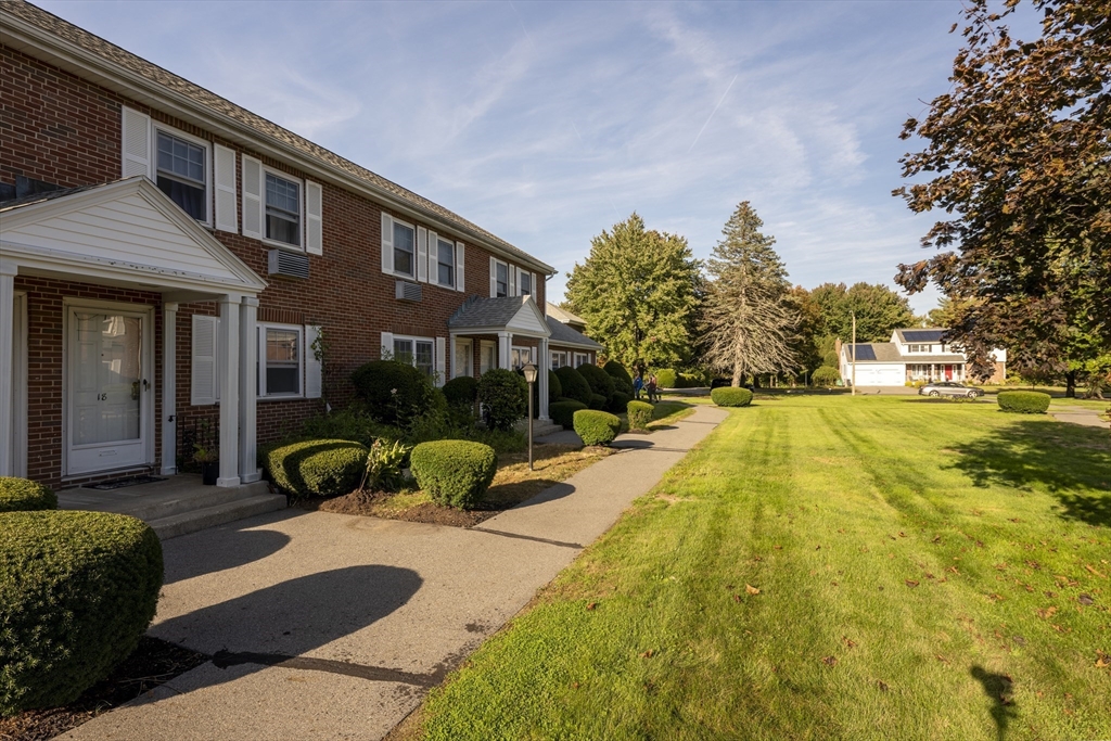 18 Emerson Gardens Road, Unit 18 Lexington, MA 02420 - Photo 22 of 23 a view of swimming pool with patio