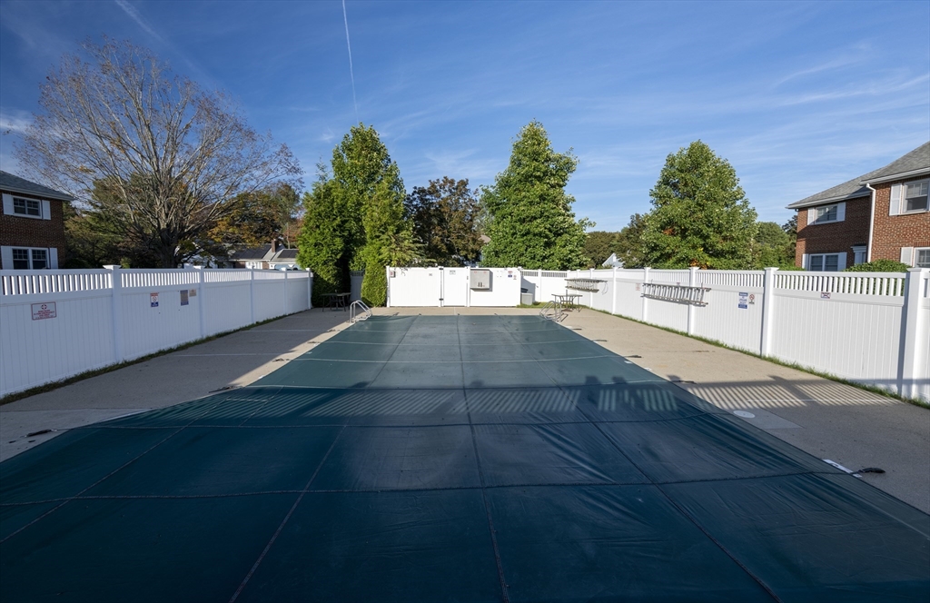 18 Emerson Gardens Road, Unit 18 Lexington, MA 02420 - Photo 23 of 23 a view of a terrace