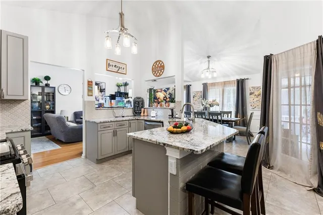 a view of kitchen and dining area with furniture