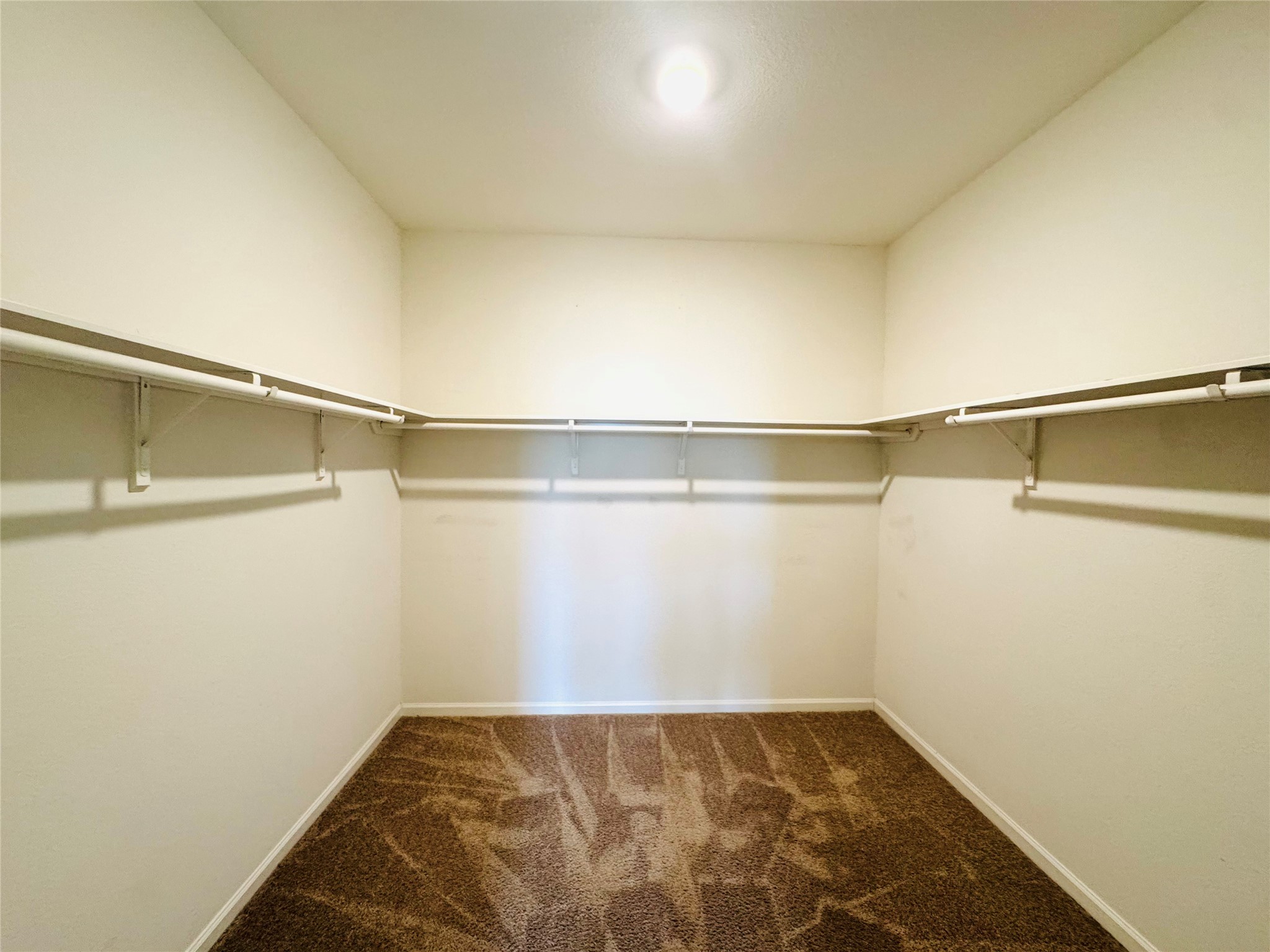 1013 Pitch Pine Brookshire, TX 77423 - Photo 21 of 30 a view of a room with racks on the wall