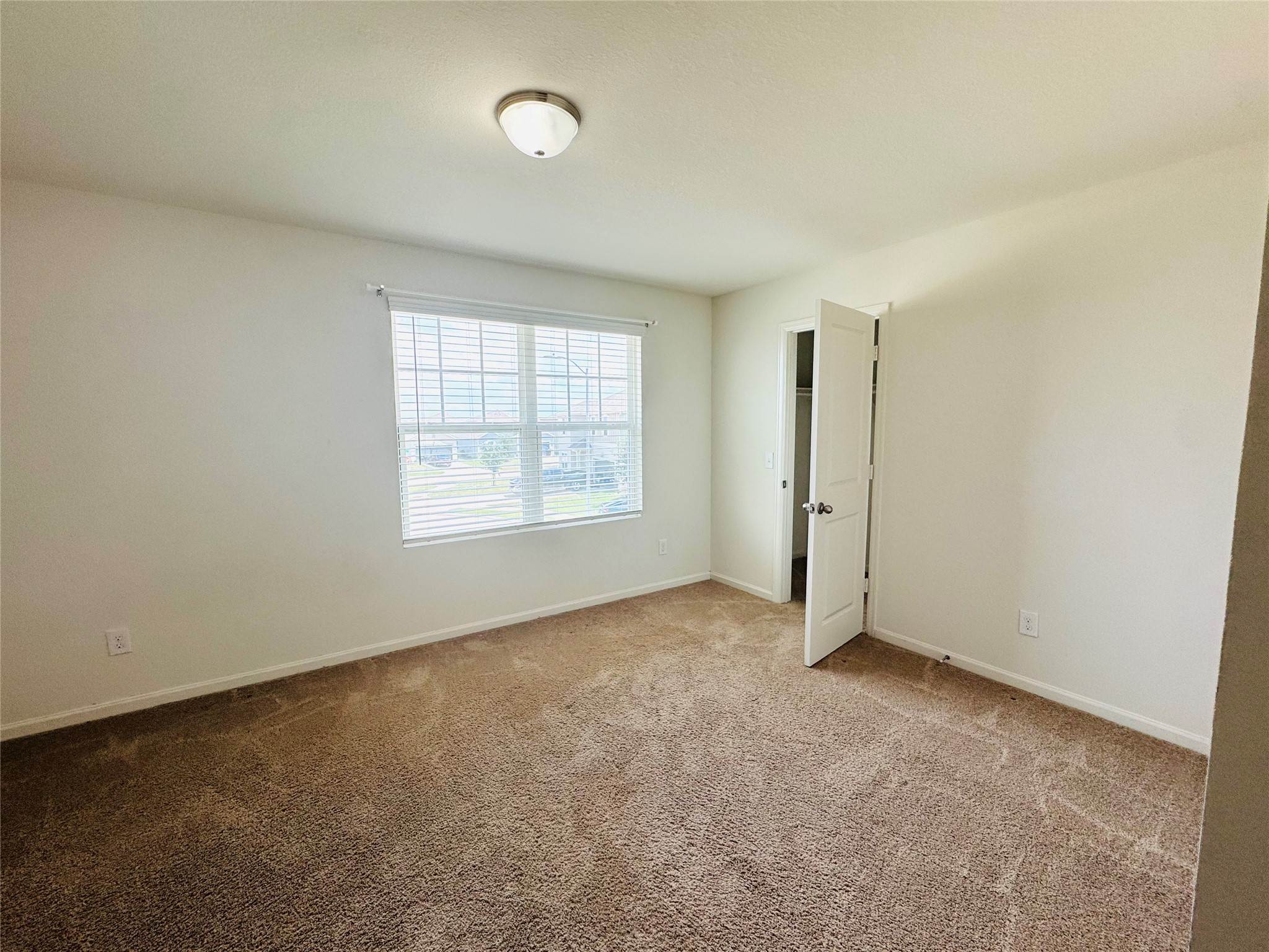 1013 Pitch Pine Brookshire, TX 77423 - Photo 27 of 30 an empty room with windows