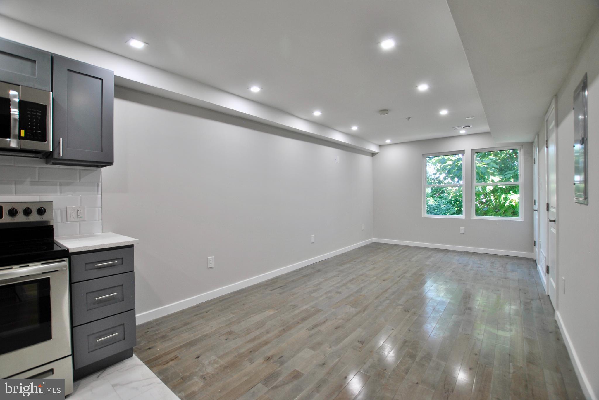 2153 North 19th Street, Unit 4 Philadelphia, PA 19121 - Photo 3 of 17 a view of an empty room with a window