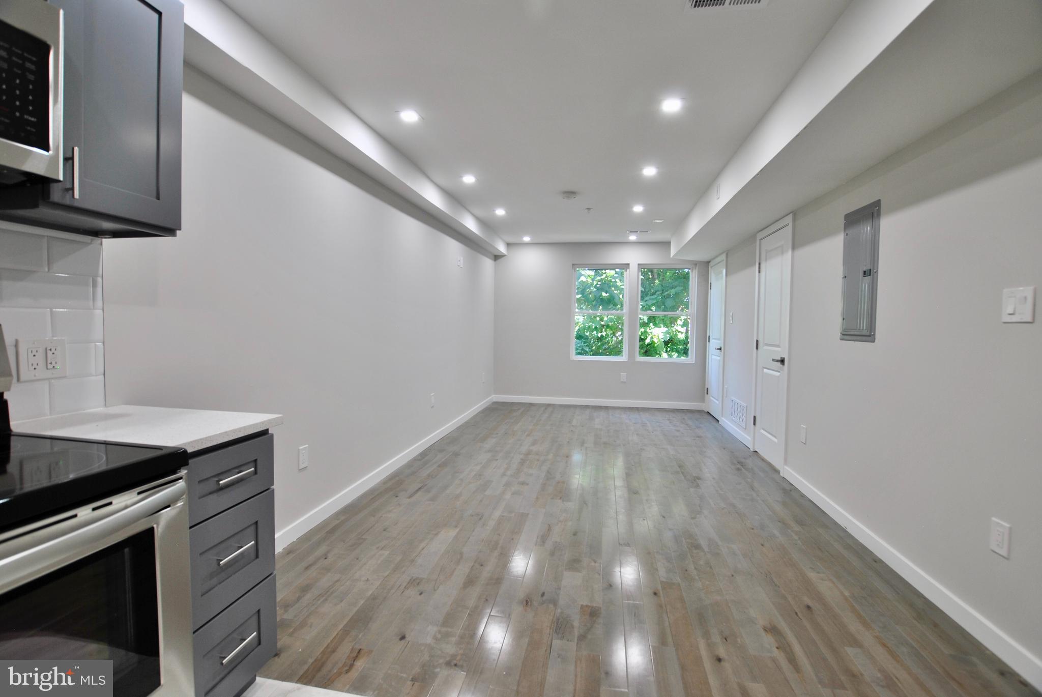 2153 North 19th Street, Unit 4 Philadelphia, PA 19121 - Photo 4 of 17 a view of an empty room with a window