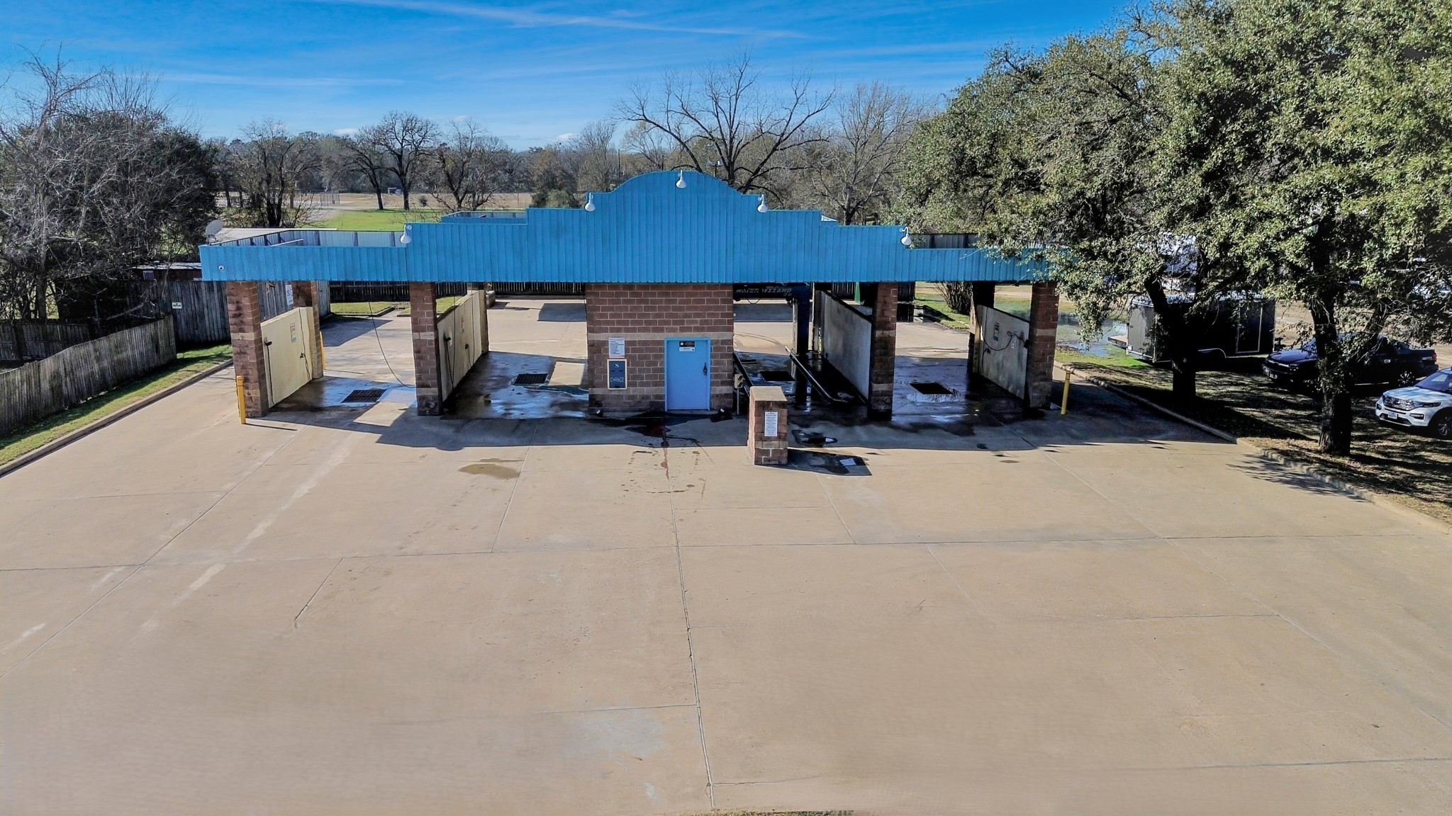 452 South Robb Street Trinity, TX 75862 - Photo 1 of 8 a view of patio with a table and chairs under an umbrella