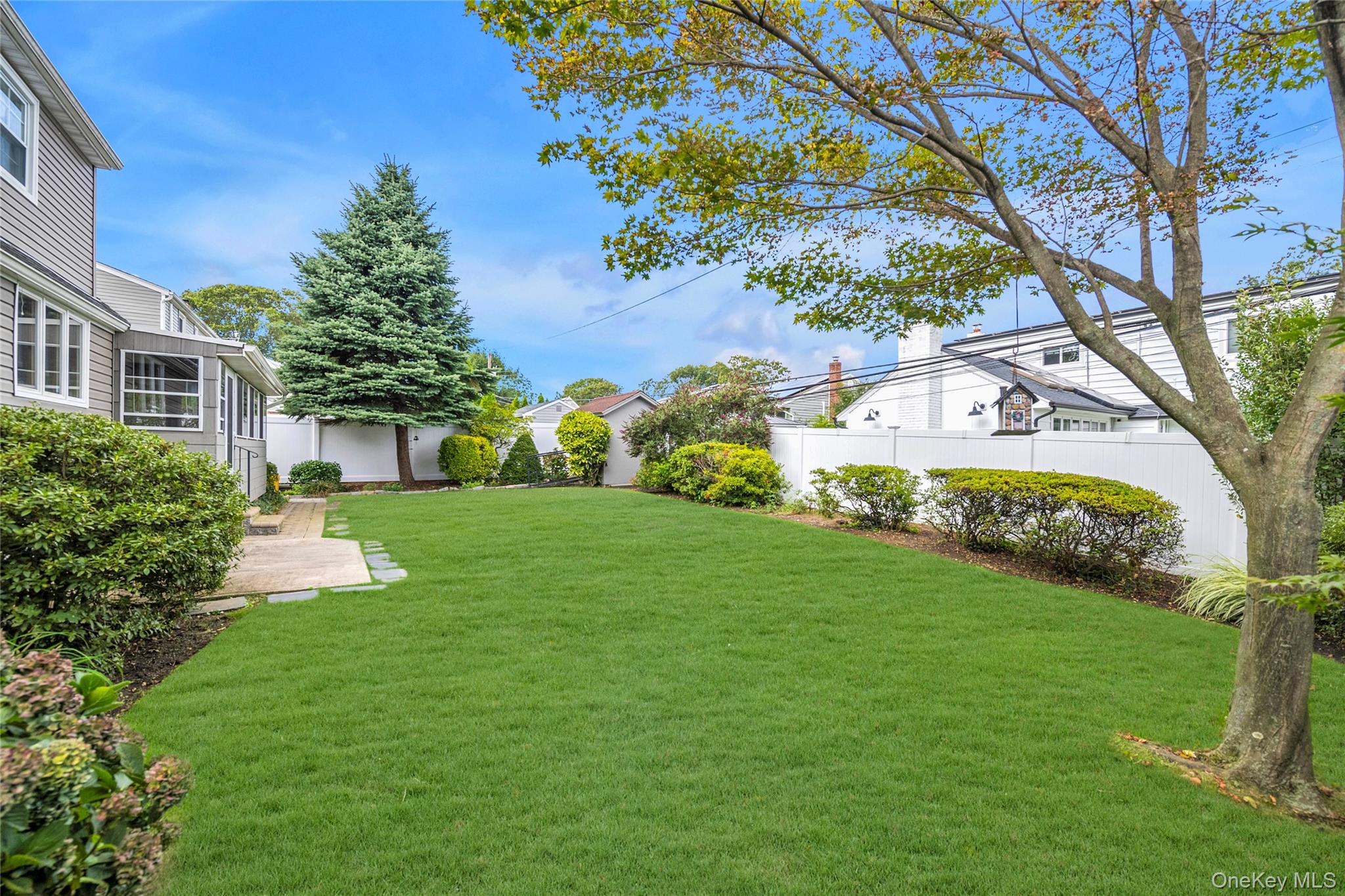 21 Farragut Road Old Bethpage, NY 11804 - Photo 21 of 22 View of fenced backyard