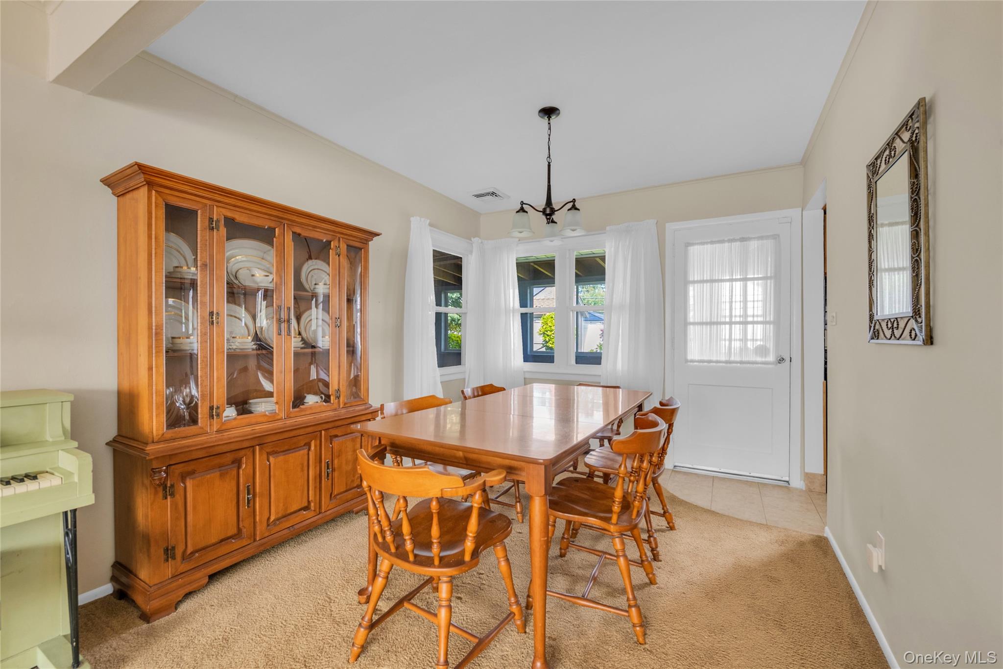 21 Farragut Road Old Bethpage, NY 11804 - Photo 6 of 22 Dining room featuring light carpet and light tile patterned floors