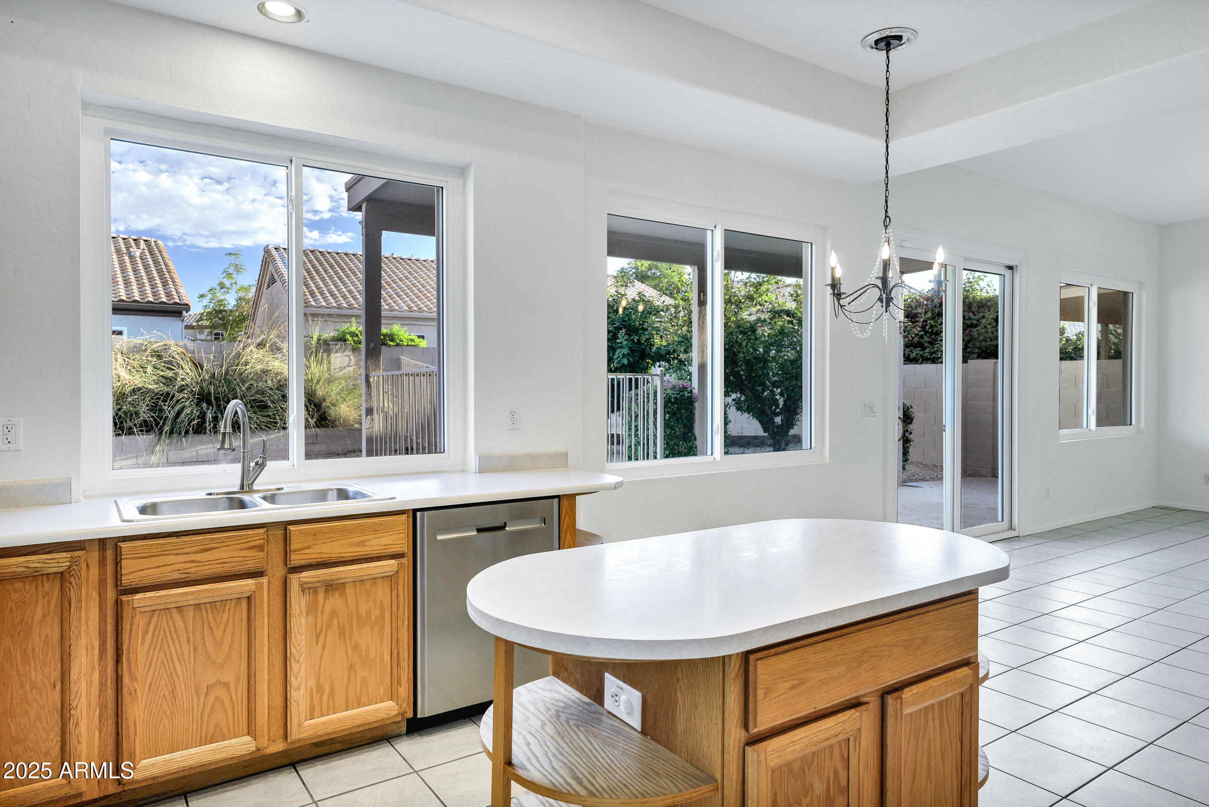 1403 West Windhaven Avenue Gilbert, AZ 85233 - Photo 20 of 64 a kitchen with a sink and window