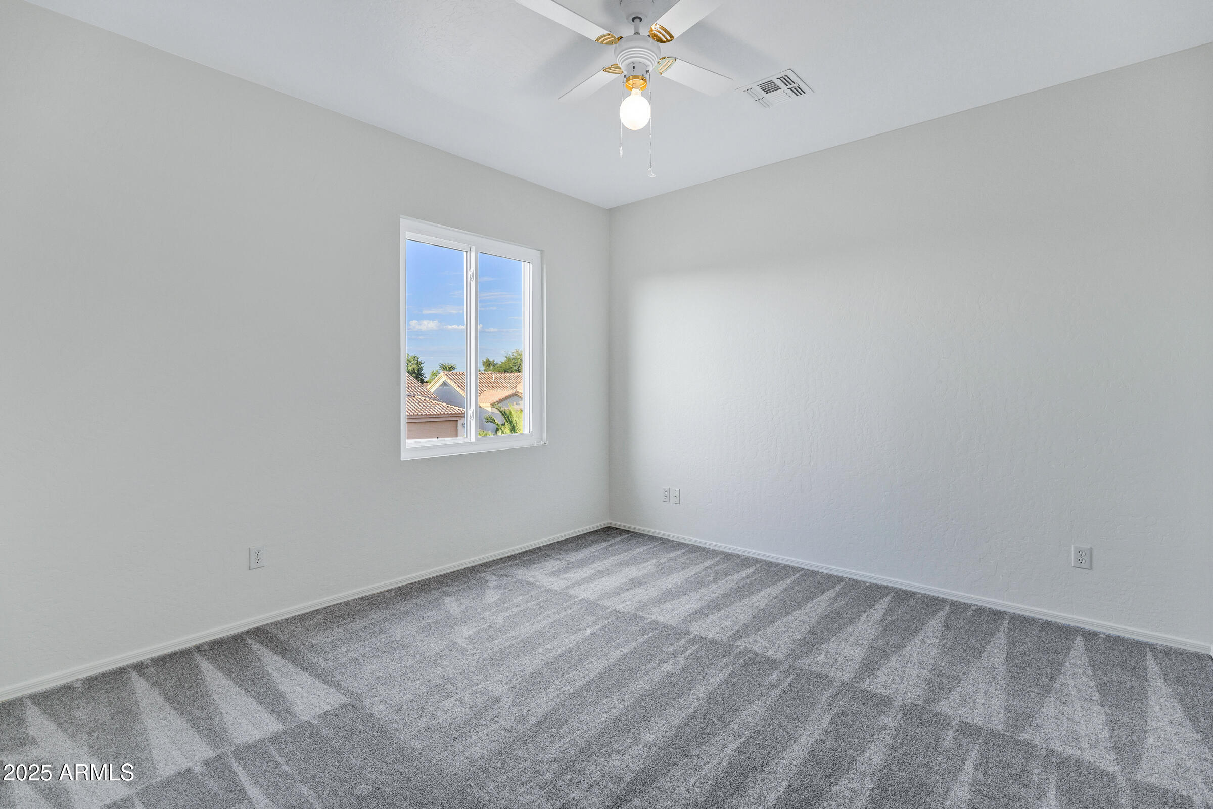 1403 West Windhaven Avenue Gilbert, AZ 85233 - Photo 25 of 64 wooden floor in an empty room with a window