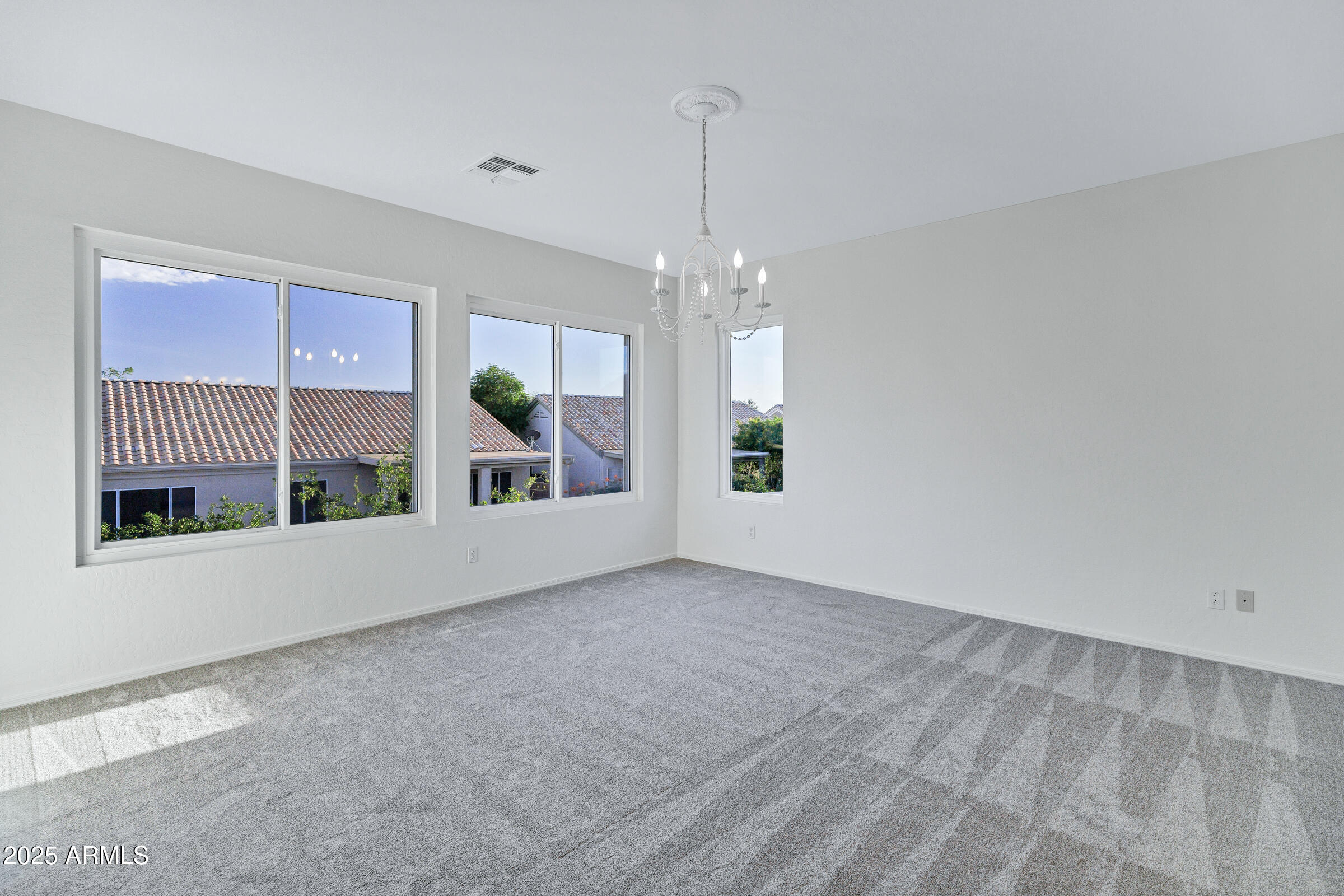 1403 West Windhaven Avenue Gilbert, AZ 85233 - Photo 30 of 64 a view of an empty room with a window