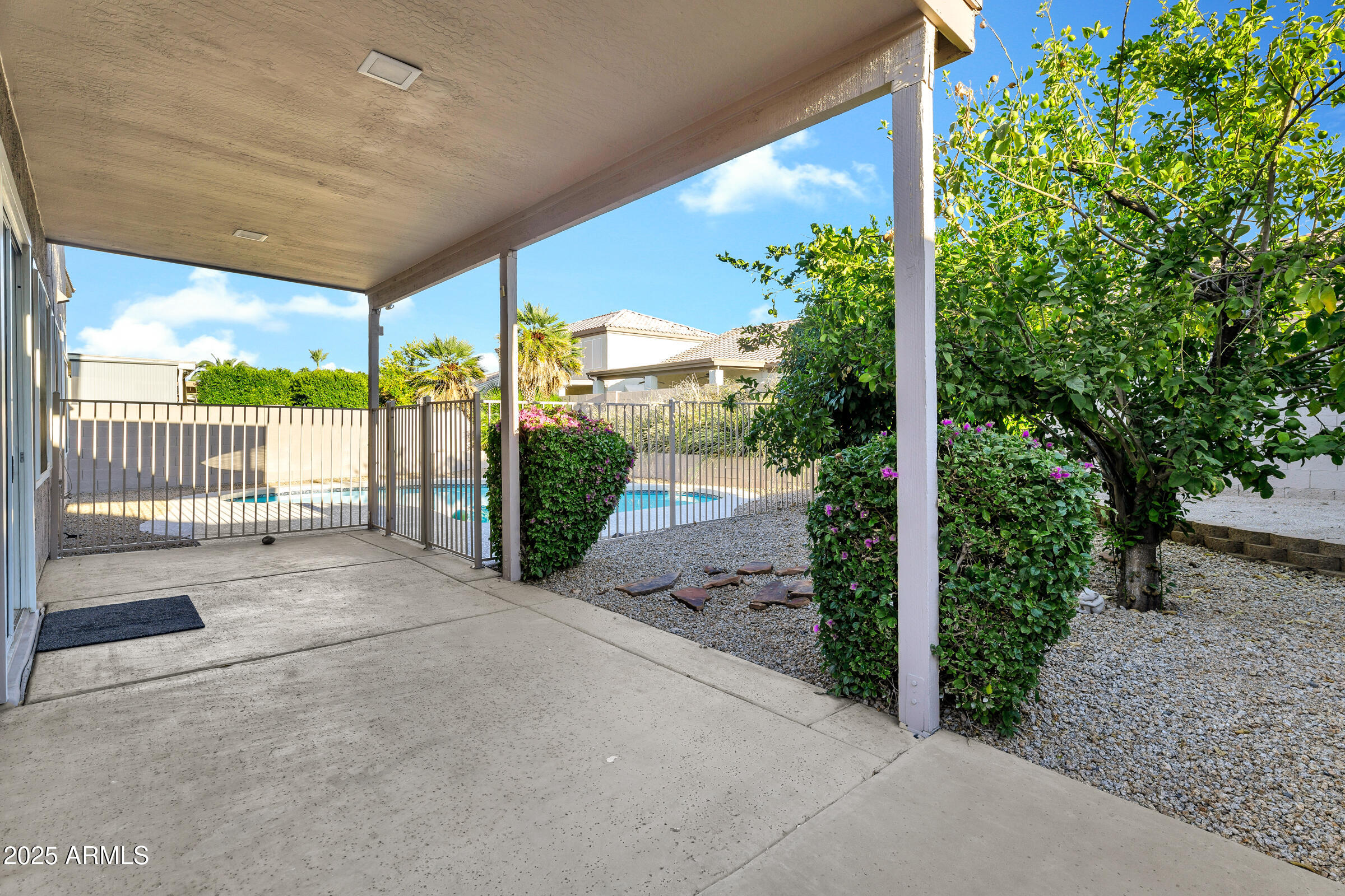 1403 West Windhaven Avenue Gilbert, AZ 85233 - Photo 40 of 64 a view of a backyard