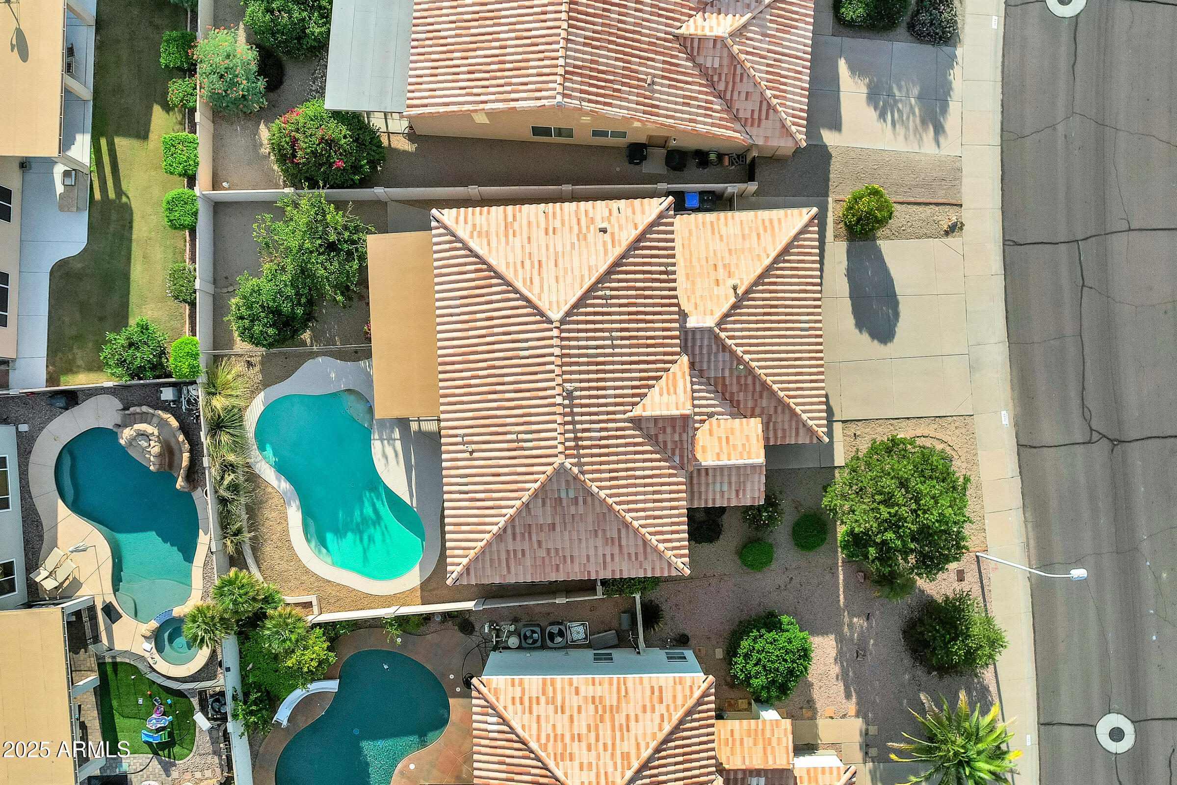 1403 West Windhaven Avenue Gilbert, AZ 85233 - Photo 49 of 64 an aerial view of balcony with chairs
