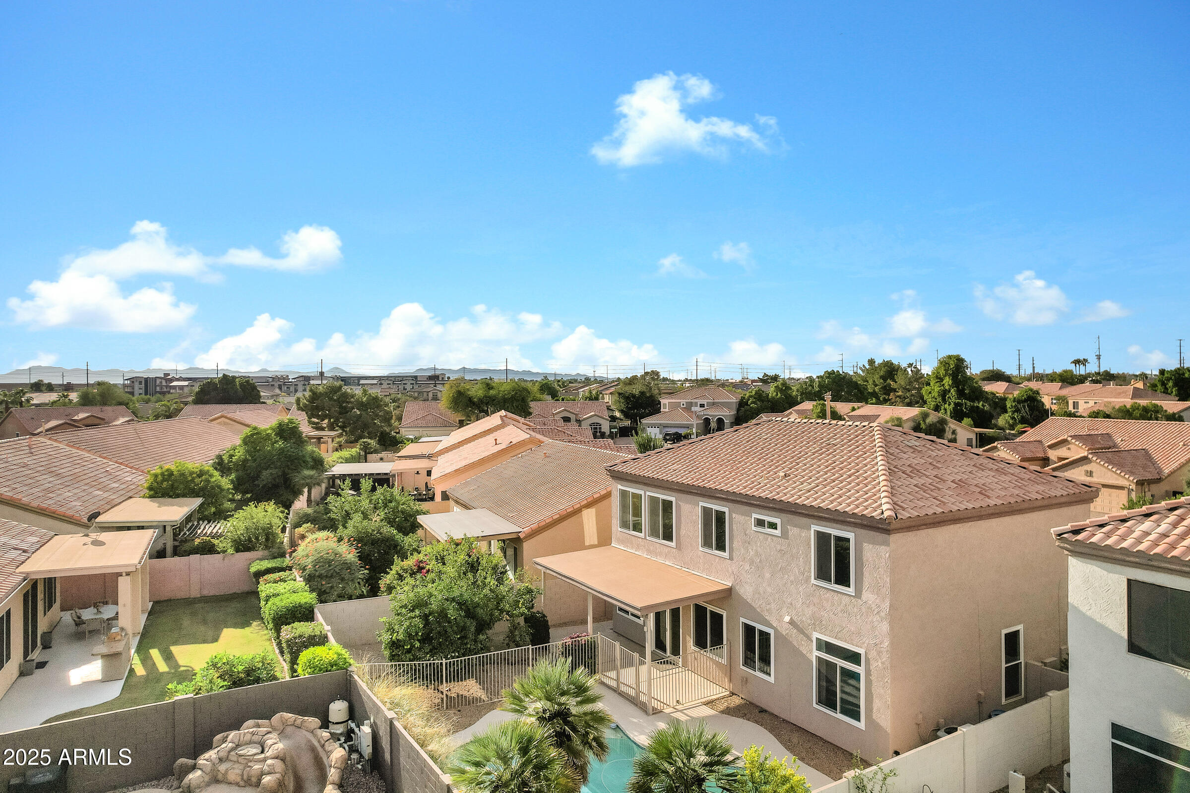 1403 West Windhaven Avenue Gilbert, AZ 85233 - Photo 57 of 64 a view of a city from a terrace
