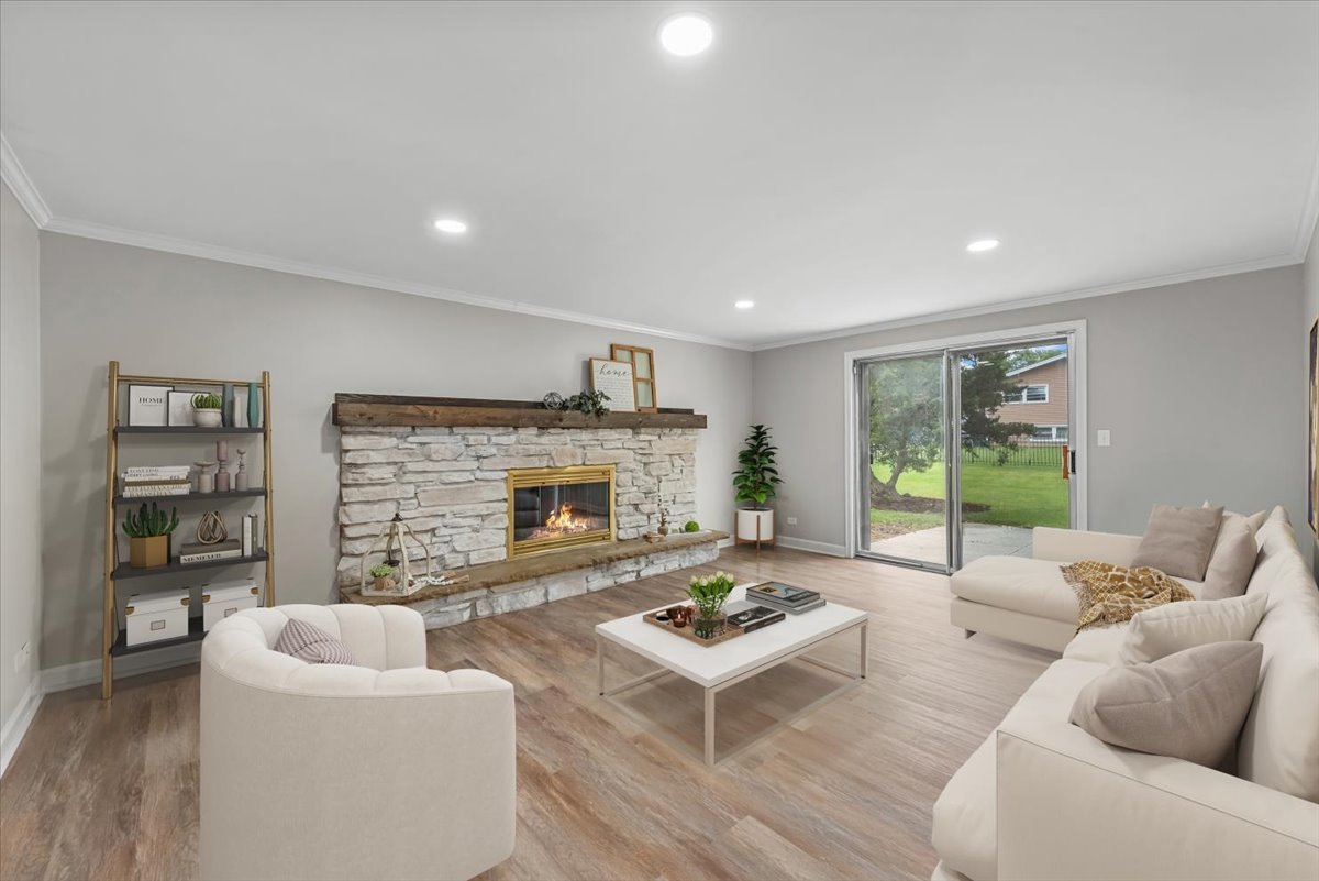415 Laconia Court Schaumburg, IL 60193 - Photo 14 of 36 a living room with furniture and a fireplace