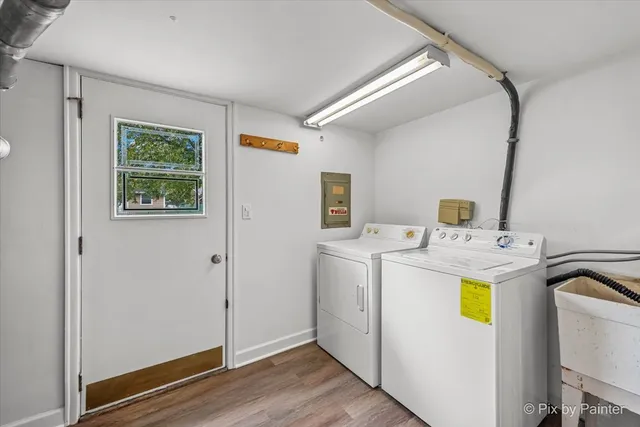a view of storage room with washer and dryer