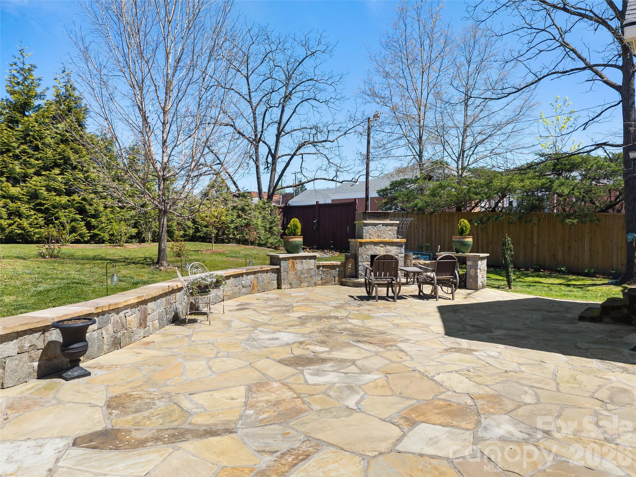 60 West Morgan Street Brevard, NC 28712 - Photo 29 of 48 a view of a house with backyard and sitting area