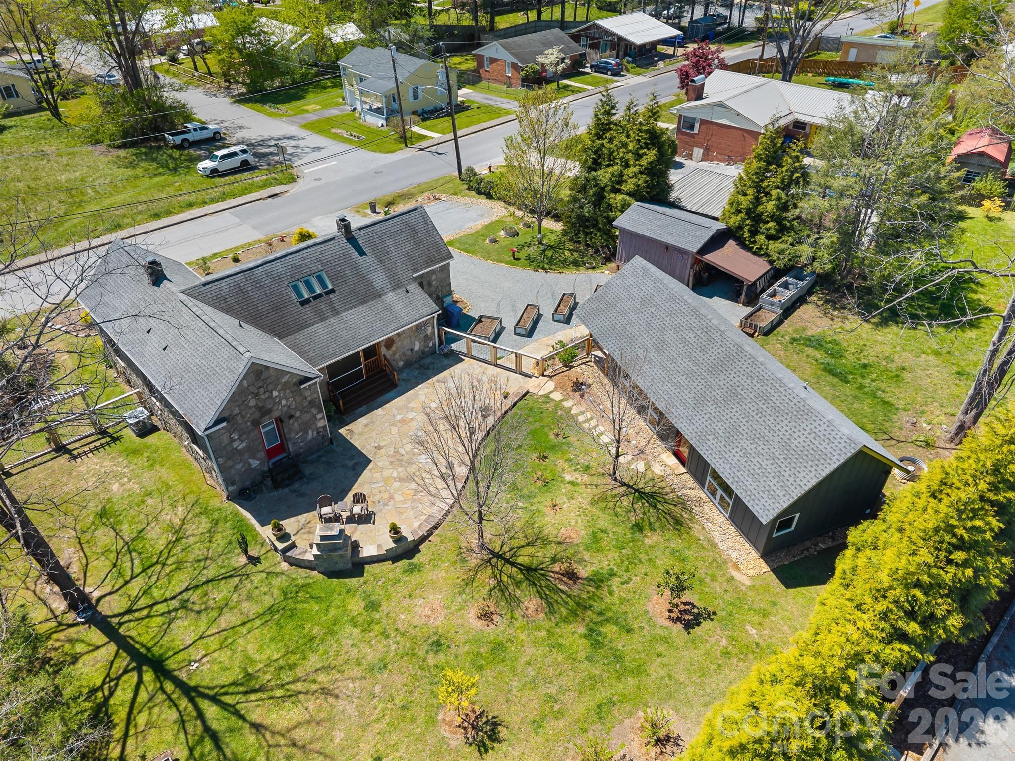 60 West Morgan Street Brevard, NC 28712 - Photo 4 of 48 an aerial view of a house with yard swimming pool and outdoor seating