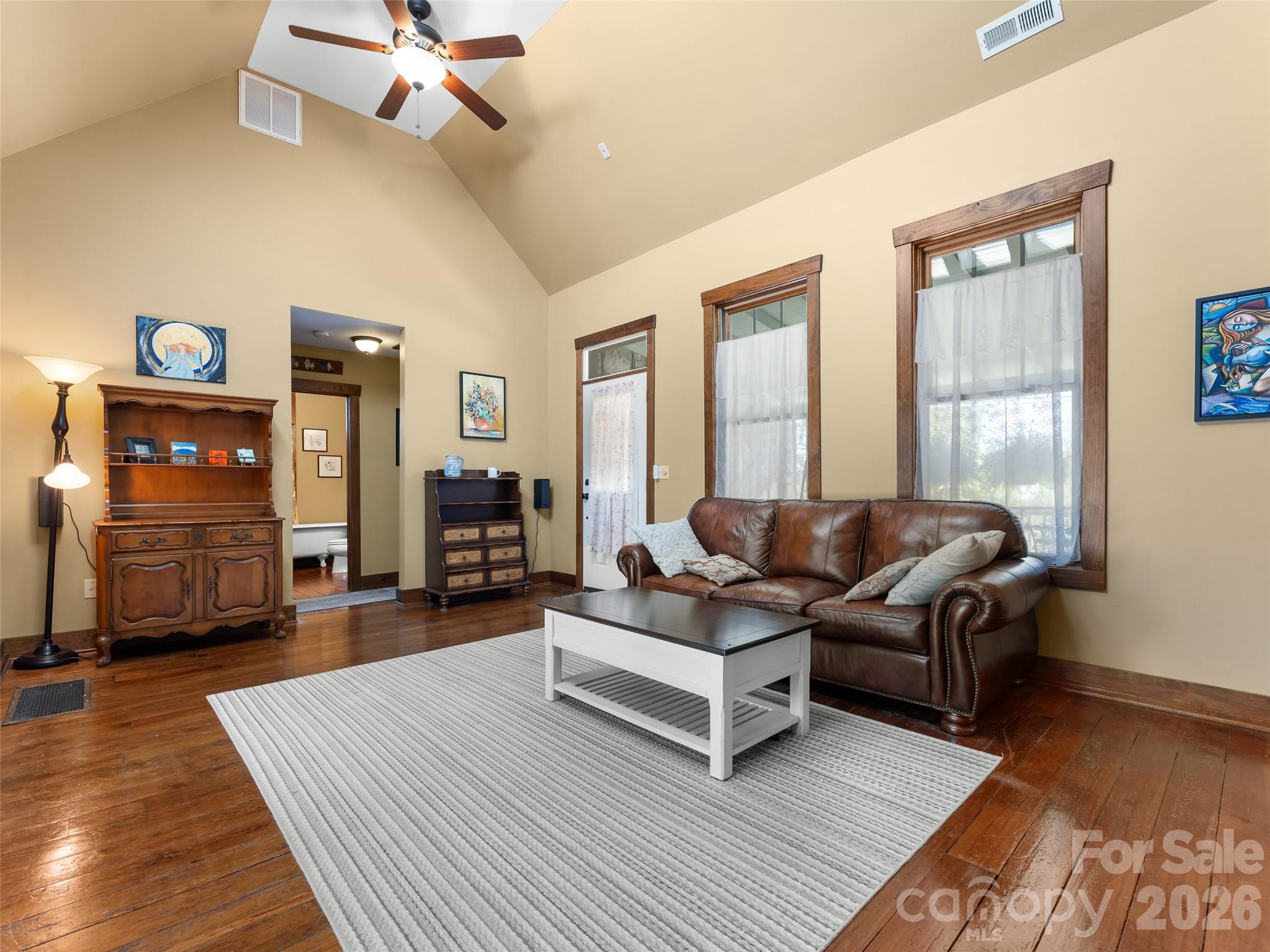 60 West Morgan Street Brevard, NC 28712 - Photo 8 of 48 a living room with furniture and wooden floor