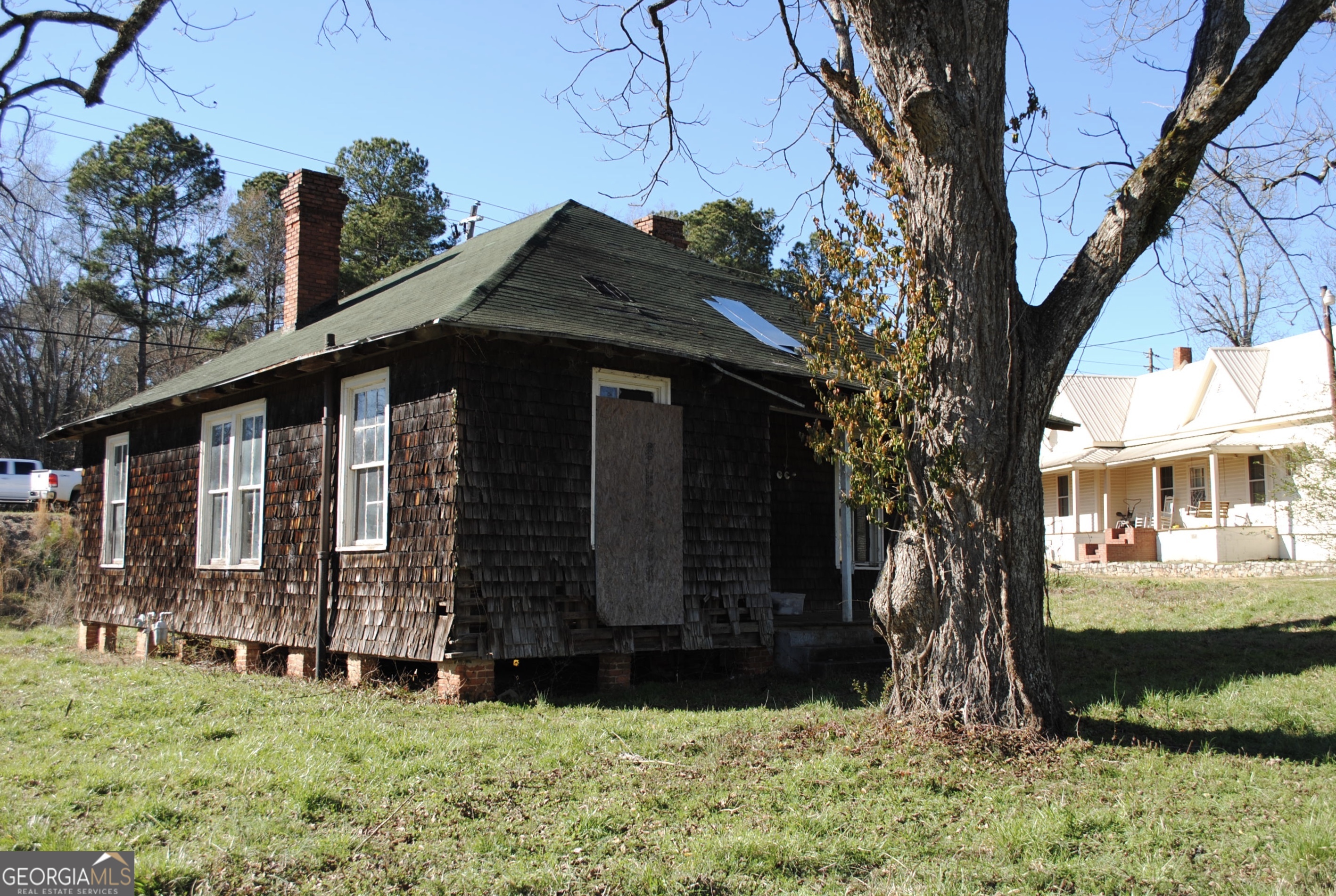 9822 Jones Street Sparta, GA 31087 - Photo 37 of 52 a view of a house with a yard