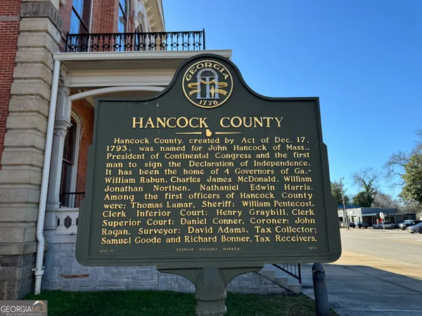 a view of swimming pool with a yard