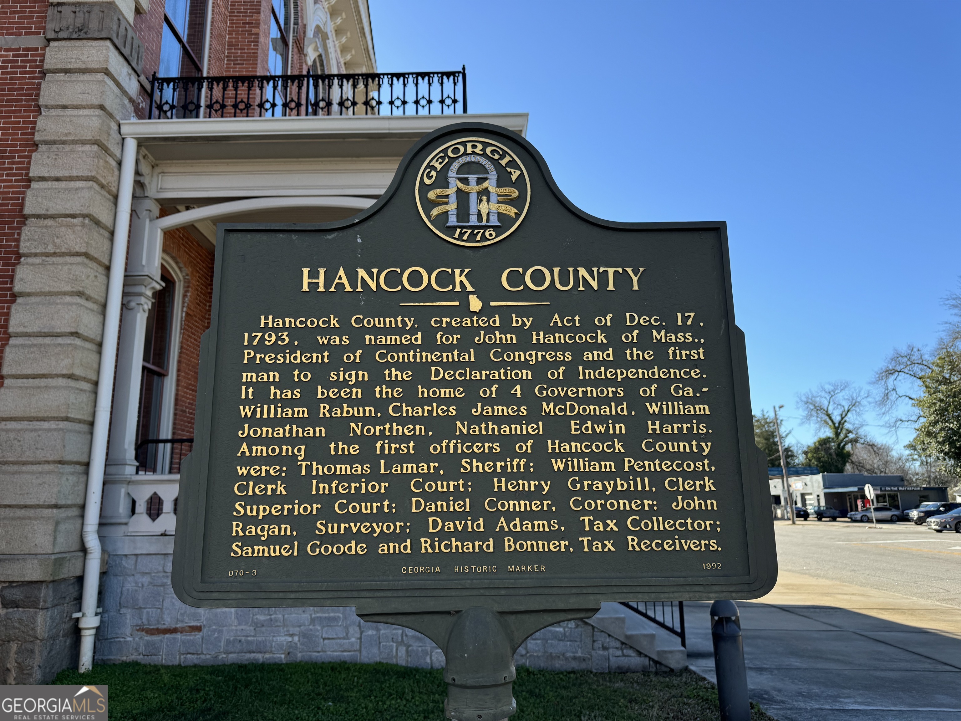 9822 Jones Street Sparta, GA 31087 - Photo 46 of 52 a sign on the side of a building