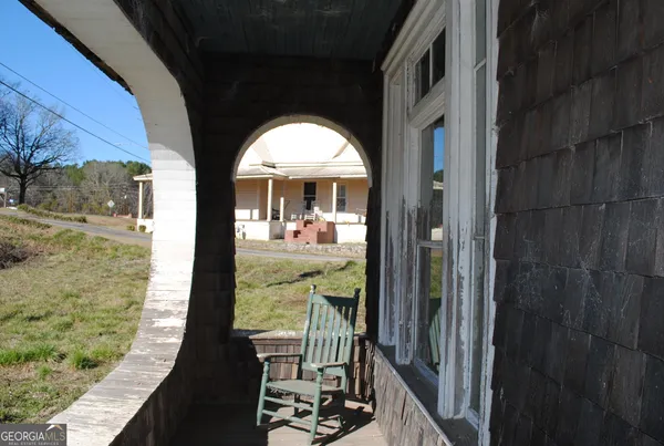 a front view of a house with garage