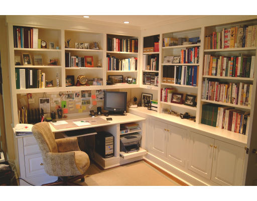 4 Claybrook Road Dover, MA 02030 - Photo 11 of 22 a view of a kitchen with furniture and a book shelf