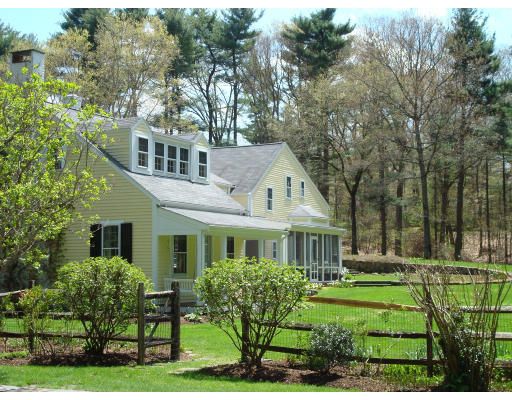 4 Claybrook Road Dover, MA 02030 - Photo 18 of 22 a front view of a house with yard and green space