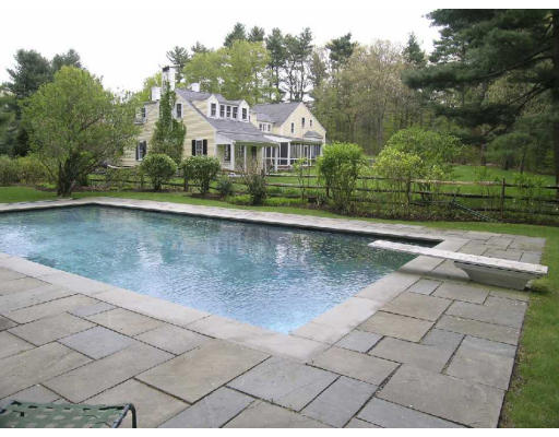 4 Claybrook Road Dover, MA 02030 - Photo 19 of 22 an outdoor view of a house with swimming pool