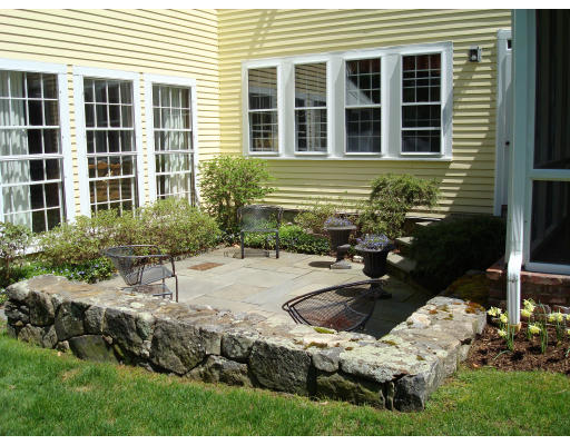 4 Claybrook Road Dover, MA 02030 - Photo 22 of 22 a front view of a house with a yard