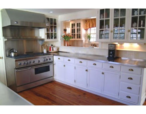 4 Claybrook Road Dover, MA 02030 - Photo 9 of 22 a kitchen with granite countertop a stove and cabinets