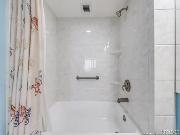 a bathroom with a bathtub