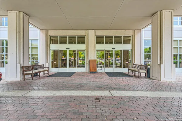 a view of a patio with couches table and chairs