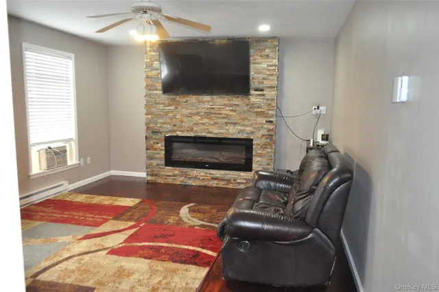 a view of a dining room with furniture and window