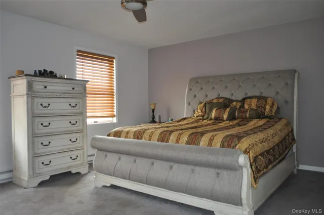 a view of a workspace with furniture and staircase