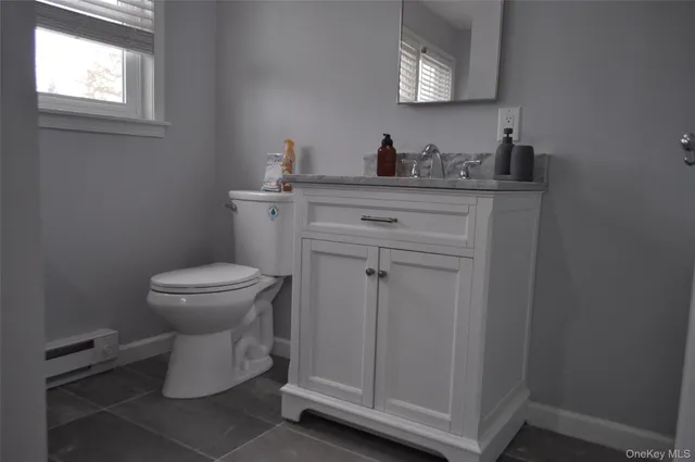 a room with furniture and a wooden floor