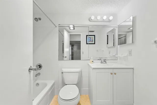 a view of swimming pool with outdoor seating