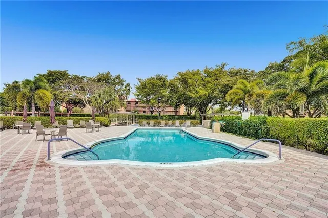 a front view of a building with street view