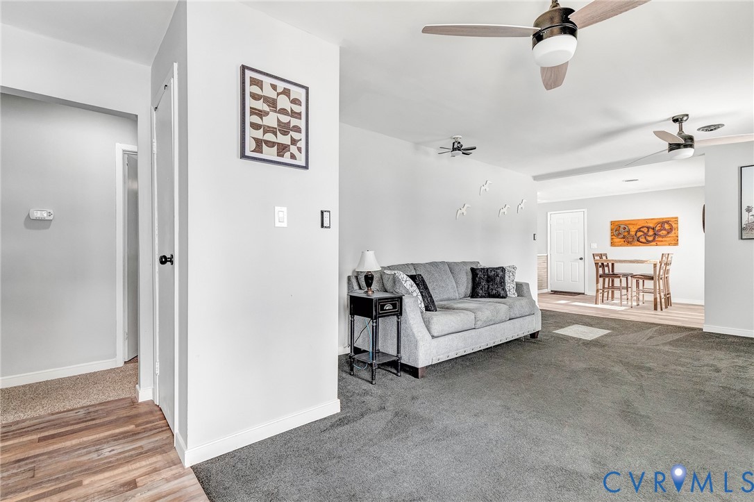 15200 Chieftain Road Disputanta, VA 23842 - Photo 14 of 44 a living room with furniture and a rug