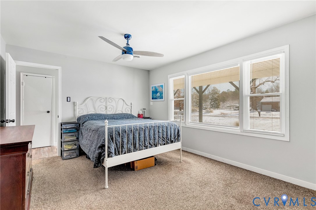 15200 Chieftain Road Disputanta, VA 23842 - Photo 21 of 44 a bedroom with a bed and a window