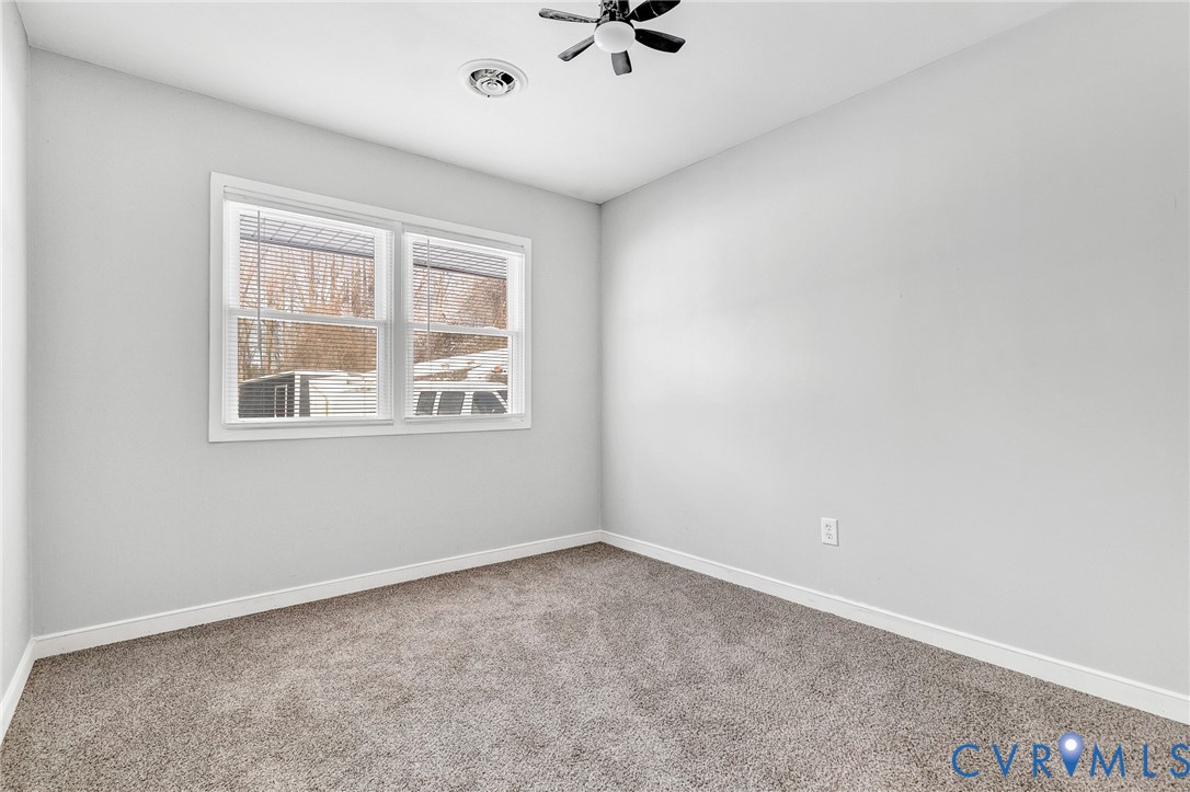 15200 Chieftain Road Disputanta, VA 23842 - Photo 28 of 44 an empty room with a window