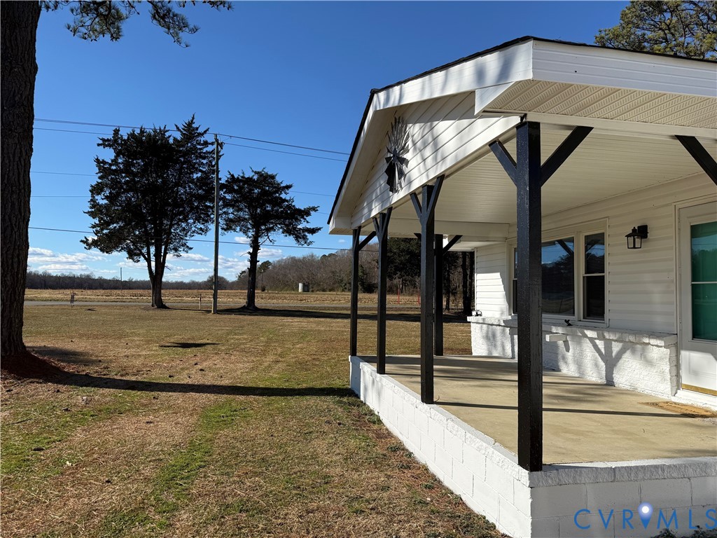 15200 Chieftain Road Disputanta, VA 23842 - Photo 33 of 44 a view of a swimming pool with a yard