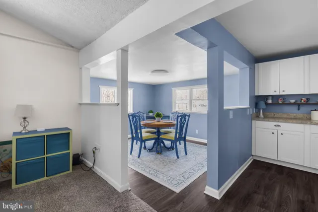 a view of kitchen with furniture and window