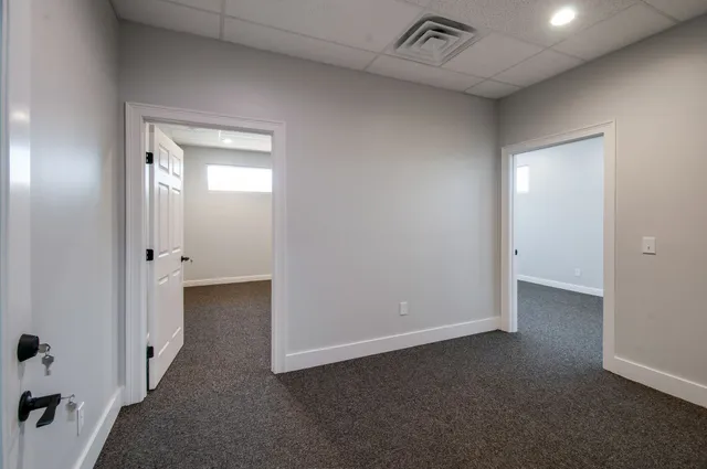 a view of a hallway with closet