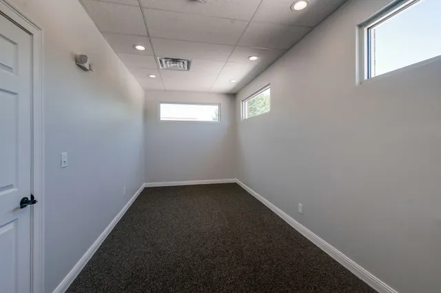 an empty room with windows