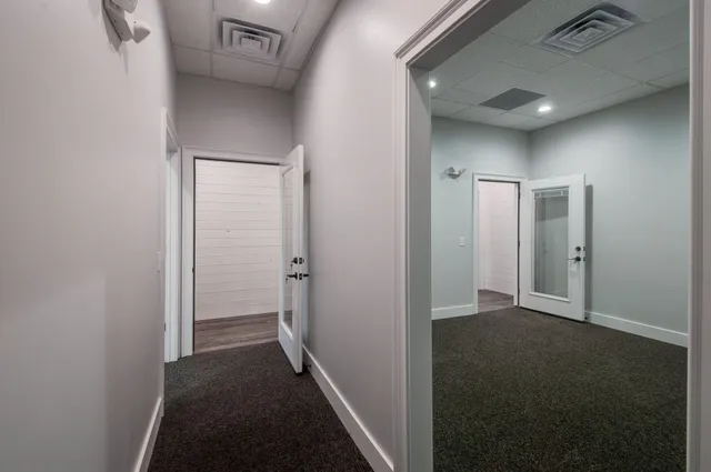 a view of hallway with livingroom