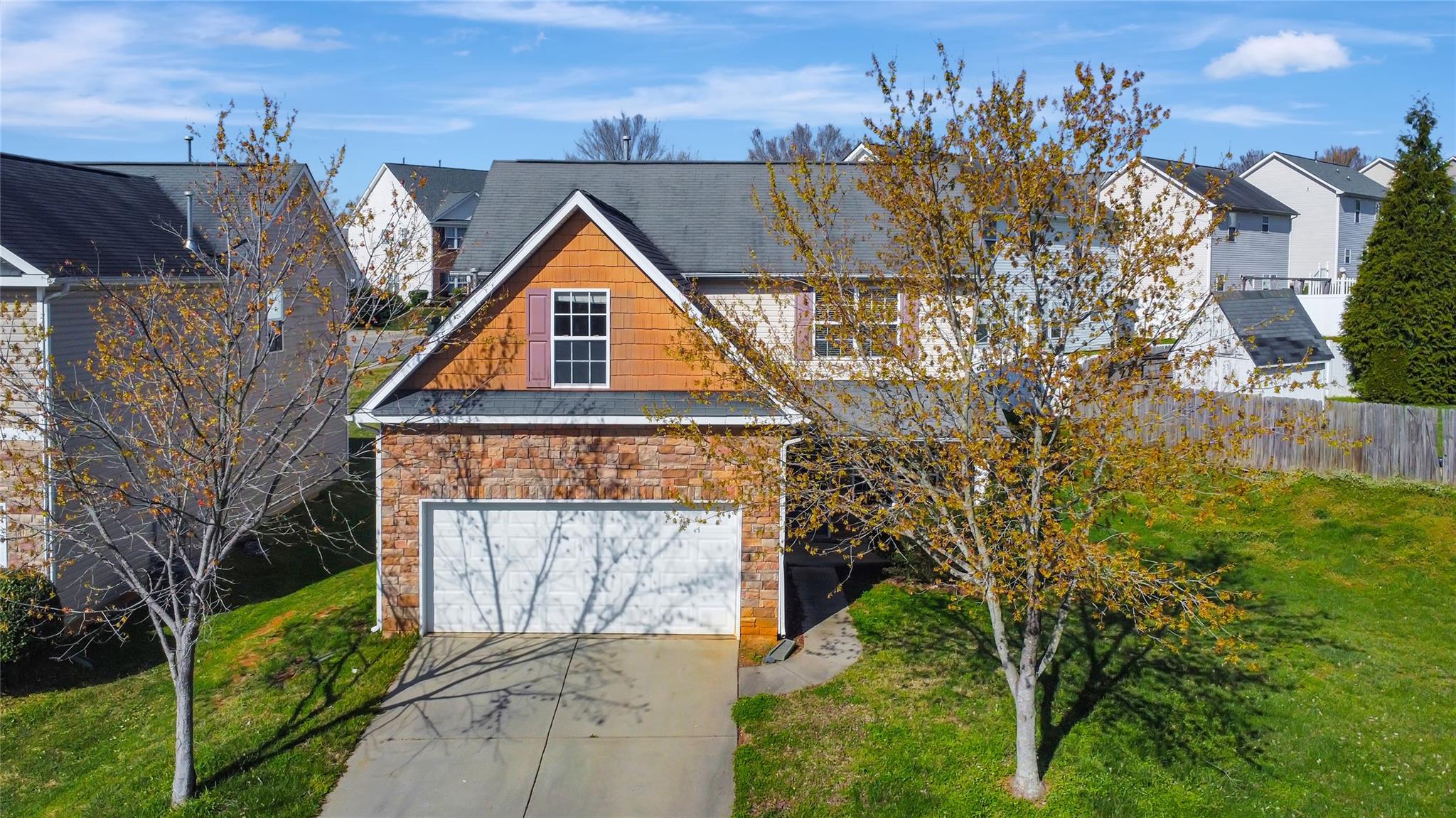 front view of a house with a yard