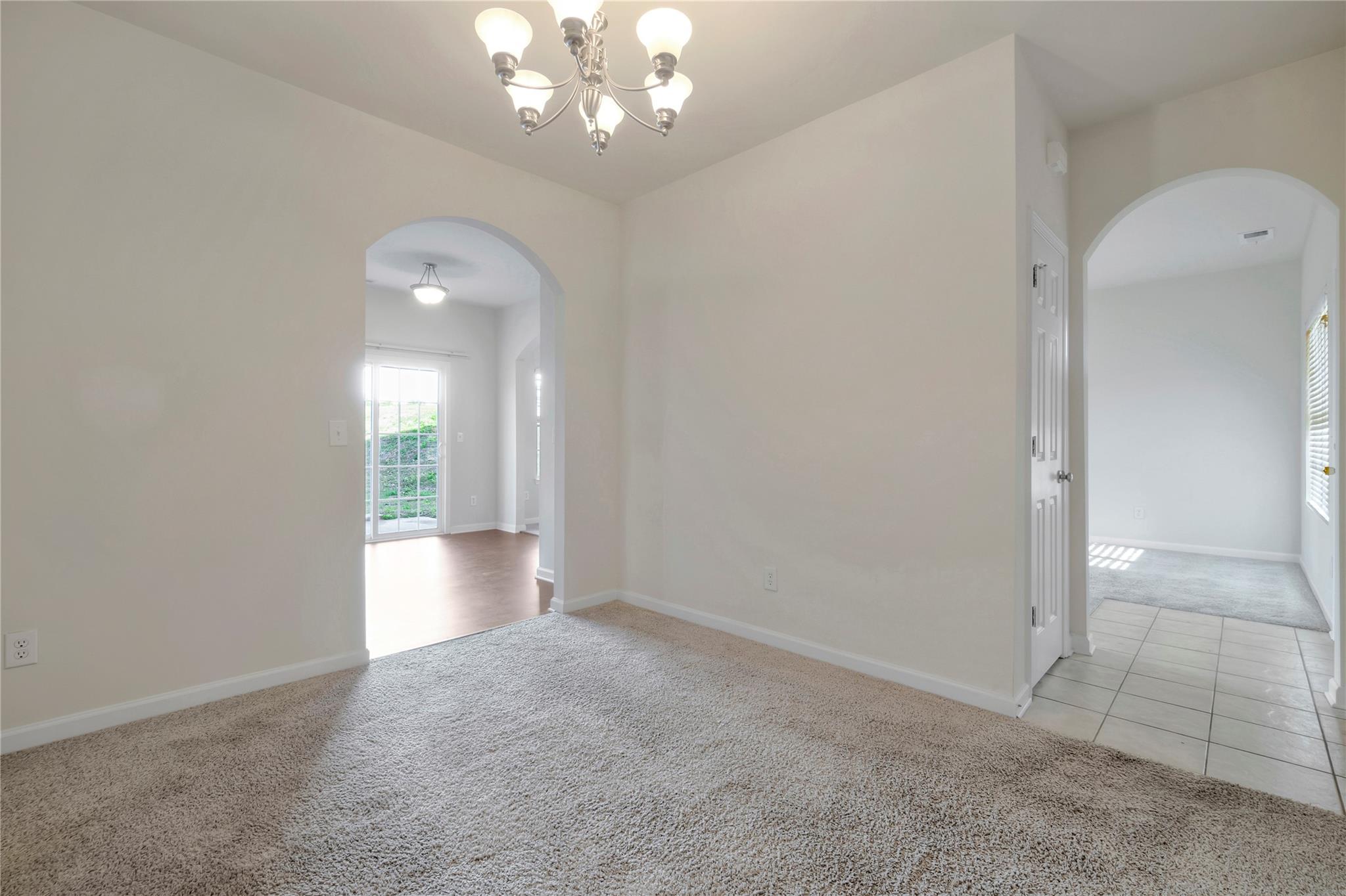 3008 Clover Road Northwest Concord, NC 28027 - Photo 12 of 45 wooden floor in an empty room with a window